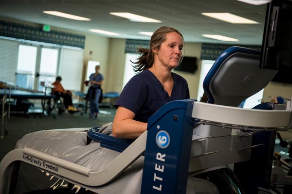 Woman running on Alter G