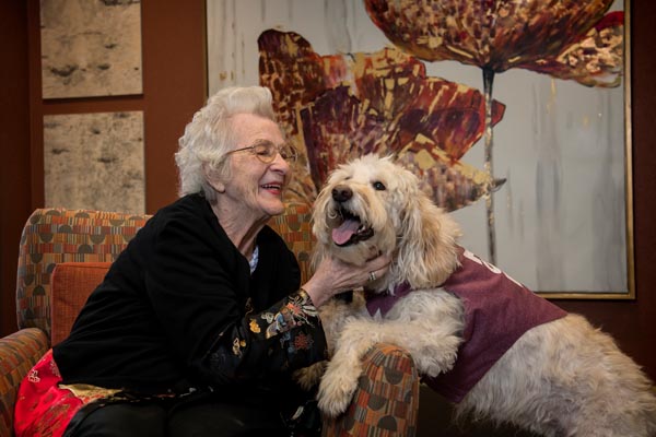 Woman and therapy dog