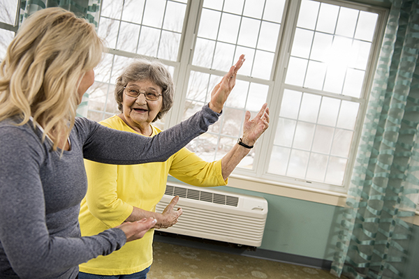 Woman in yellow tai chi